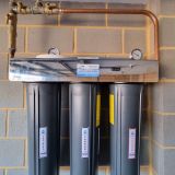 Whole House Water Filtration Perth - On Wall In Garage